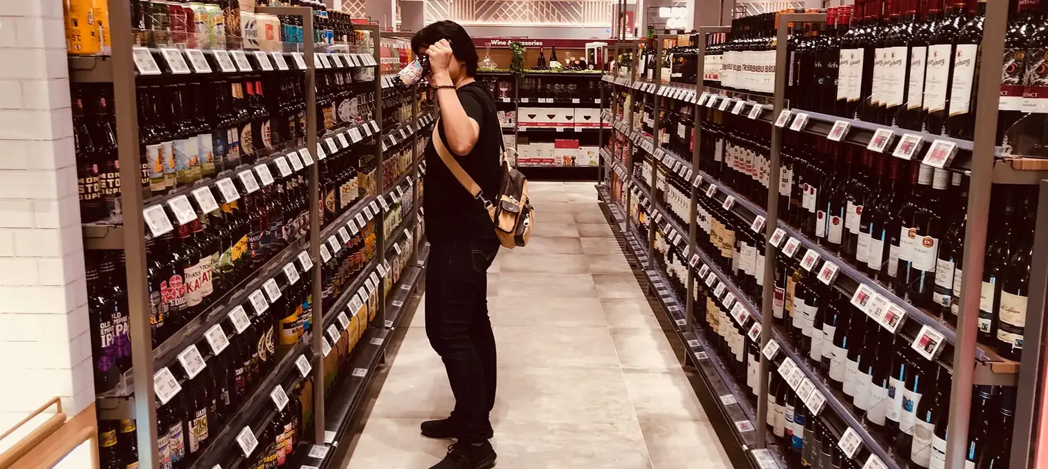 Man in bottle shop