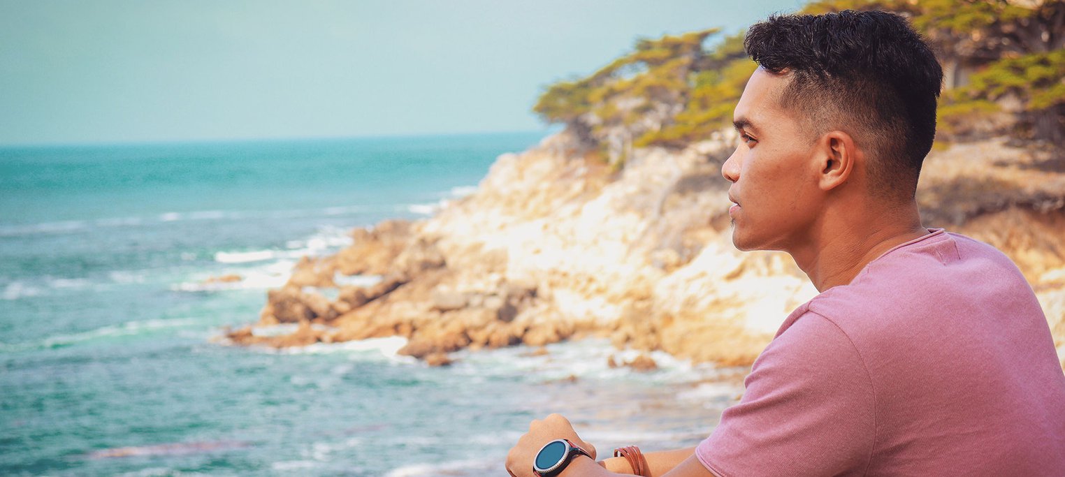 Man looks out to ocean