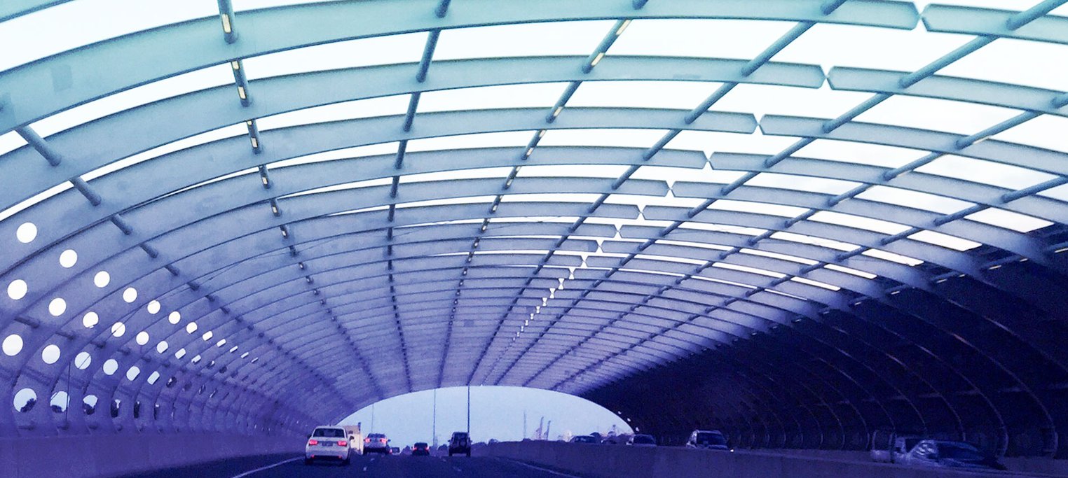 driving over urban bridge in Melbourne