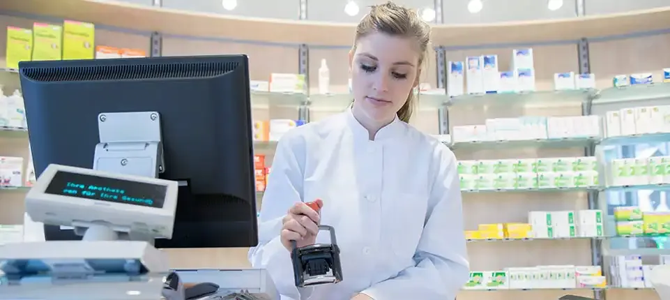 pharmacist filling a prescription