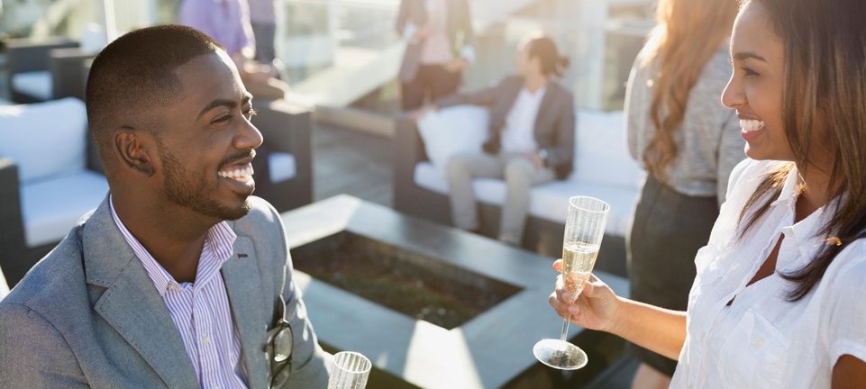 smiling couple drinking