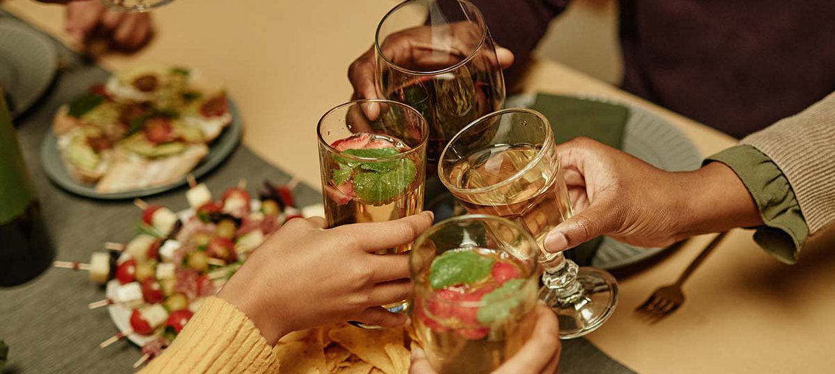 Group of people toasting at dinner